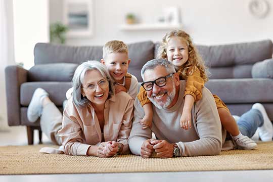 Grandparents playing with their grandchildren