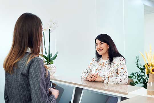 Woman seeking a second opinion on her hearing aids