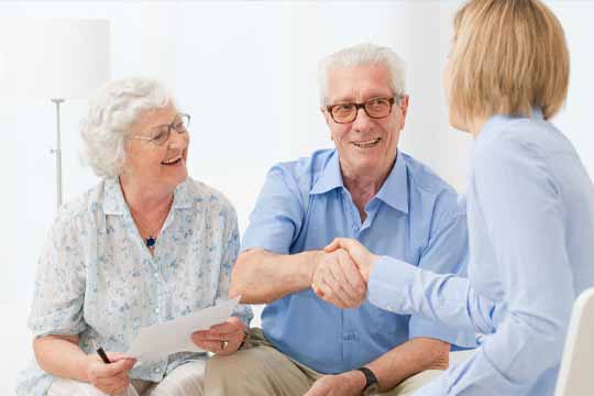 Older couple chatting with Doctor about Cognivue Cognitive Testing.